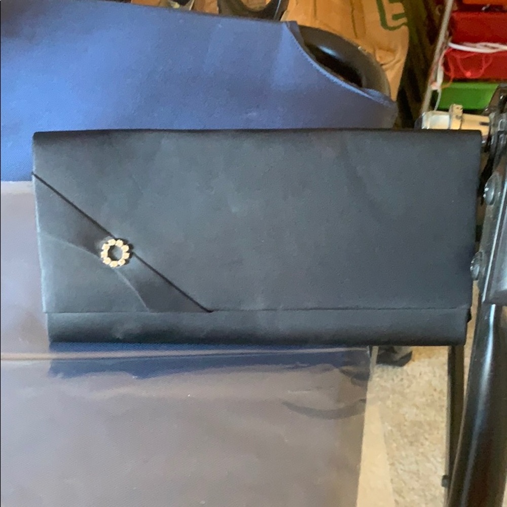 Black satin rhinestone embellished clutch.